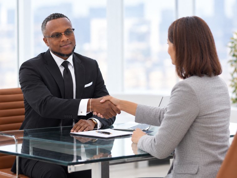 Maxime of Destiny Health Sentinel greeting a client