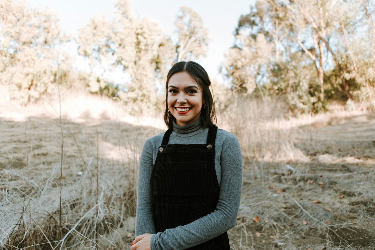 Smiling small business owner in a work apron